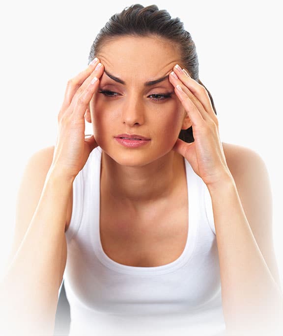 Person experiencing sinus headache relief options in Livonia, MI